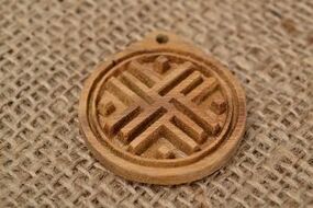 Lucky talisman made of wood and burlap